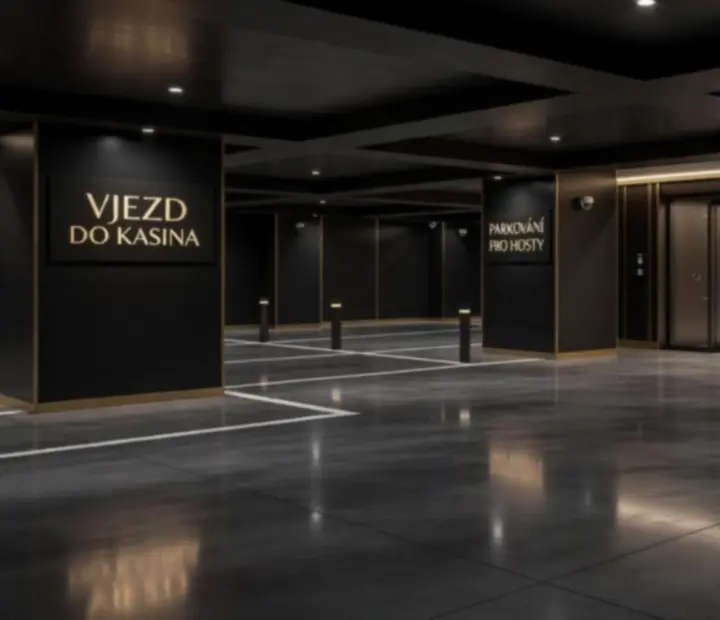 Noční příjezdová cesta k Royal Zenvo casinu s podzemním parkovištěm